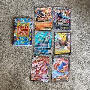 Pokemon Super Deluxe Essential Handbook and 6 BIG Pokémon Cards